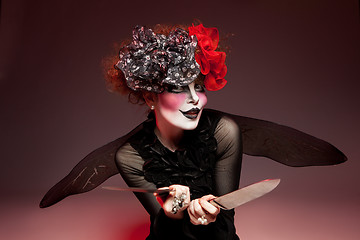 Image showing woman mime with knife