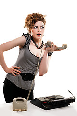 Image showing Businesswoman taking telephone call in office