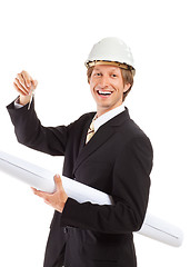 Image showing smiling engineer giving keys from apartment