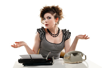 Image showing Businesswoman taking telephone call in office