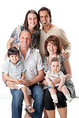 Image showing Studio Shot Of Family Group Sitting In Studio