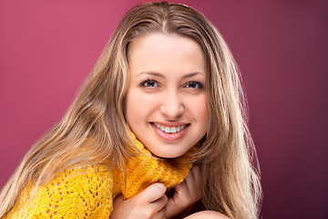 Image showing Perfect blonde on red background