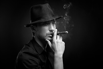 Image showing Man with hat and cigar in Black & White