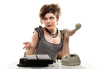 Image showing Businesswoman taking telephone call in office