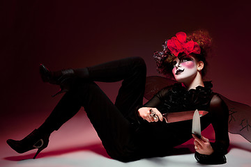 Image showing woman mime with knife