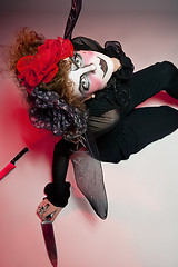 Image showing woman mime with knife