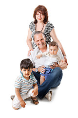 Image showing Happy grandparents with two handsome grandsons