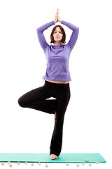 Image showing Young woman practicing yoga