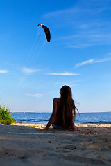 Image showing girl lying on a beach