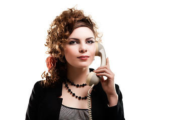 Image showing Businesswoman taking telephone call in office