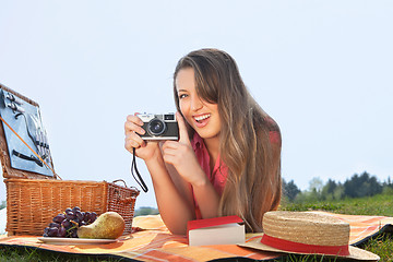 Image showing young woman making a picture