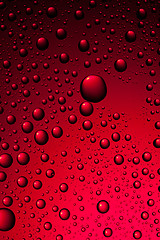 Image showing water drops on red