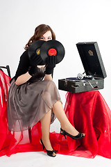 Image showing Beautiful woman with gramophone,