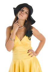 Image showing Pretty woman in yellow dress