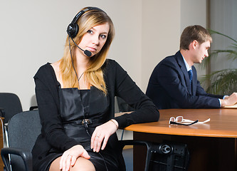 Image showing Beautiful business woman with headset