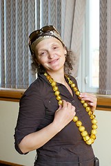 Image showing Woman with amber beads