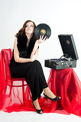 Image showing Beautiful woman with gramophone,