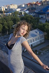 Image showing Girl on roof