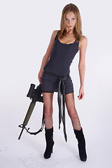 Image showing Pretty woman with rifle