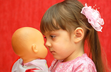 Image showing The girl and a doll