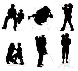 Image showing Silhouettes of parents with children