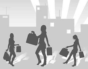 Image showing Silhouettes shopping girls on urban background