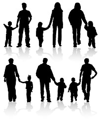 Image showing Silhouettes of parents with children