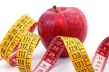 Image showing Apple and measuring tape on white