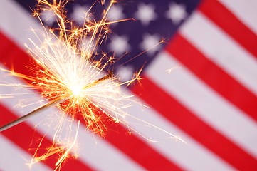 Image showing sparkler and usa flag