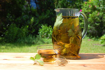 Image showing cup of tea in the garden