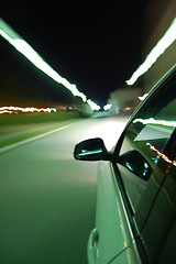 Image showing night drive with car in motion 