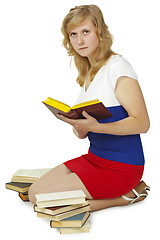 Image showing Woman - student reads books on white background