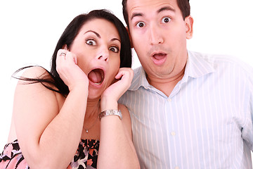 Image showing young adult couple in cinema movie theater scared while watching