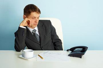 Image showing business man waiting for a phone call