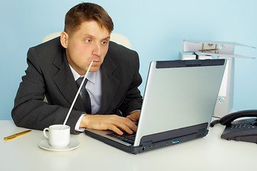 Image showing a very busy man working with laptop