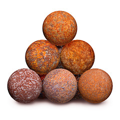 Image showing Ten rusty iron cannon balls on white background