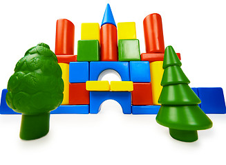 Image showing Toy colored castle and plastic trees