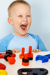 Image showing Jubilant children with toys