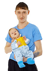 Image showing Young man is holding his son - infant