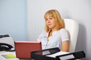 Image showing Young secretary in office workplace