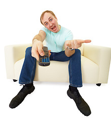 Image showing Man with TV remote control