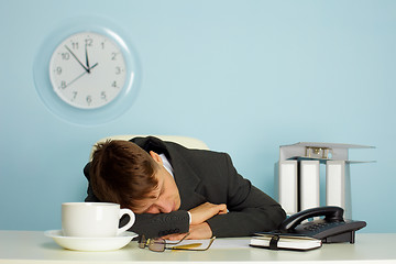 Image showing man sleeping on the job