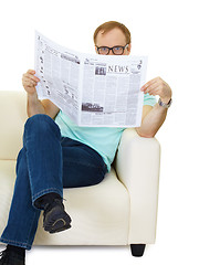 Image showing man reads the news in the newspaper