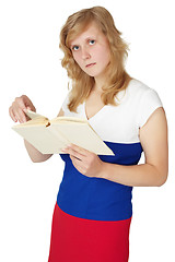 Image showing Young girl reading a book