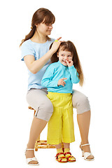 Image showing Mom makes daughter hairstyle