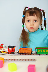 Image showing Amazed child and toy railway