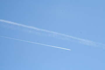 Image showing Blue sky  and signs after jet plane