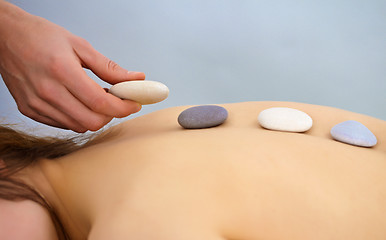 Image showing Massage procedure using round stones - Spa