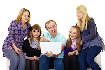 Image showing large family with a laptop
