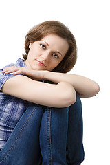 Image showing attractive girl in jeans and a blue plaid blouse